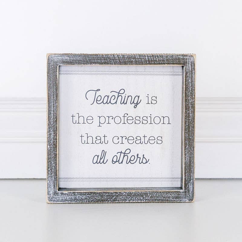 Teaching is a profession… wood sign